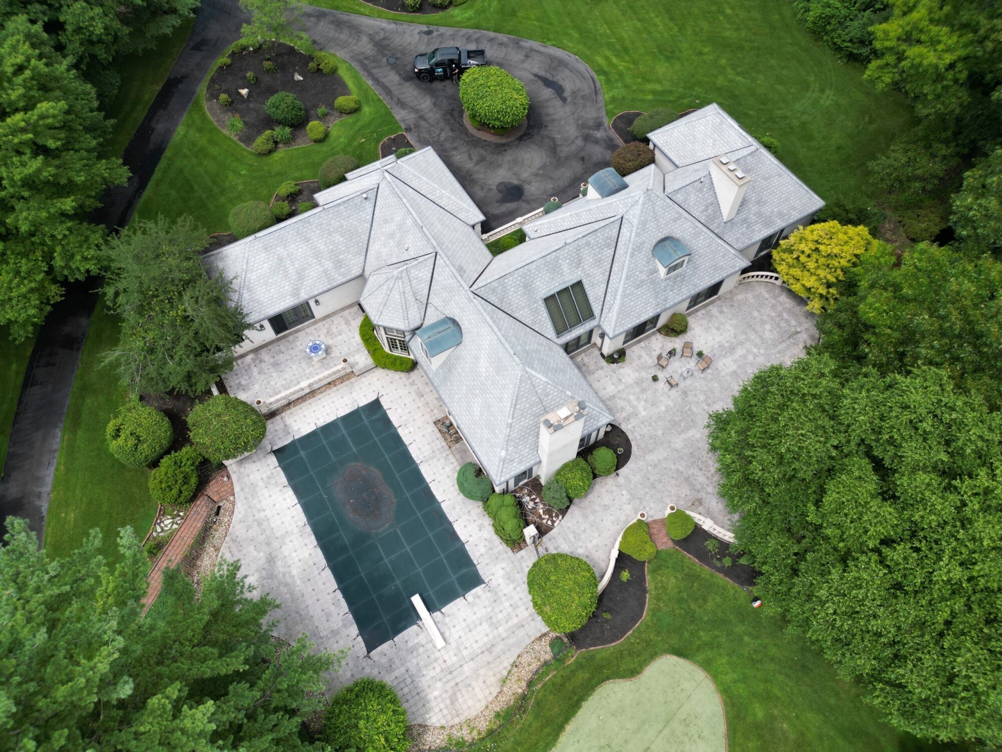 aerial premium shingle roof on beautiful home Roofing Contractor in Syracuse